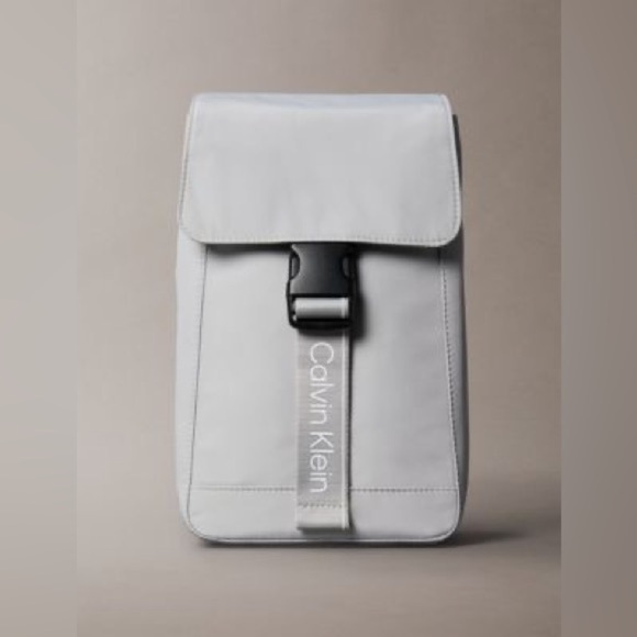 Calvin Klein Other - Calvin Klein unisex light gray sport flap sling bag